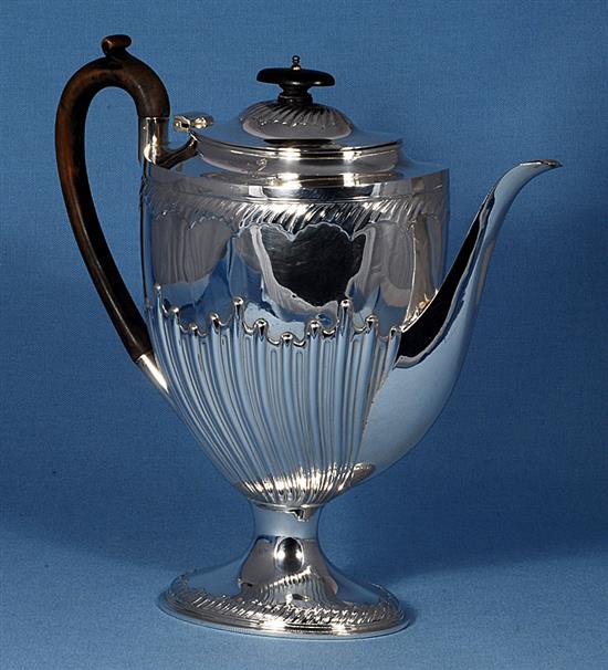 A Victorian demi fluted silver pedestal coffee pot,
